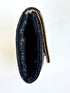 The saarinen black and silver clutch