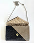 The saarinen black and silver clutch