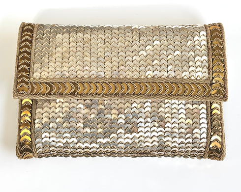 The scala silver clutch
