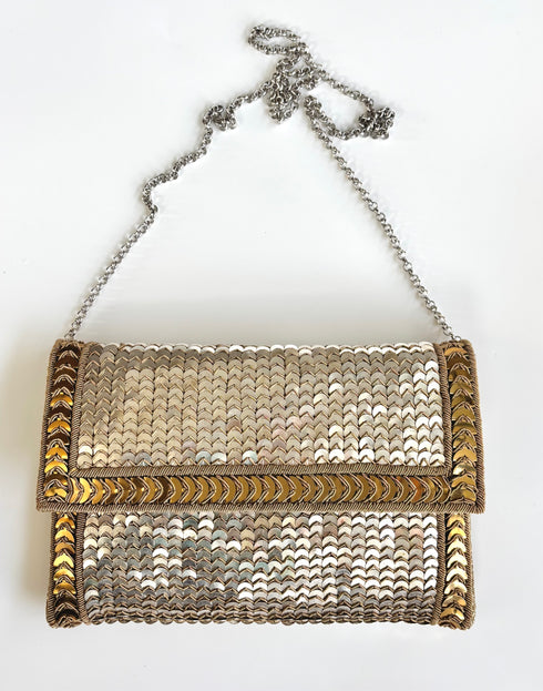 The scala silver clutch