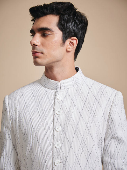 The tuck and stitch off white achkan