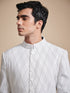 The tuck and stitch off white achkan