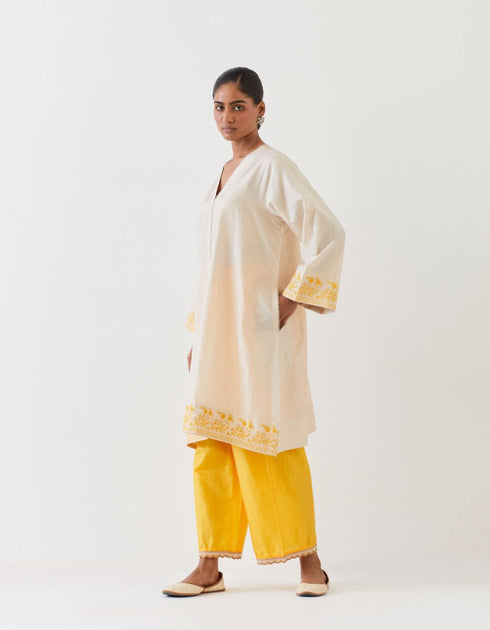 Varna champagne and mango yellow hand embroidered tunic with trousers