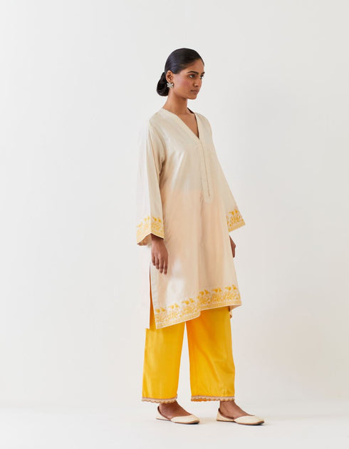 Varna champagne and mango yellow hand embroidered tunic with trousers