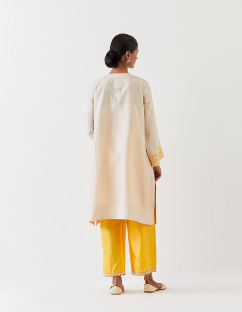 Varna champagne and mango yellow hand embroidered tunic with trousers