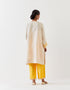 Varna champagne and mango yellow hand embroidered tunic with trousers