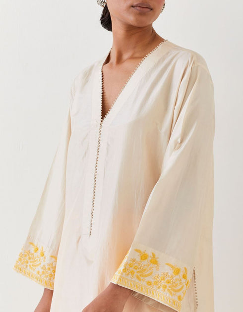 Varna champagne and mango yellow hand embroidered tunic with trousers
