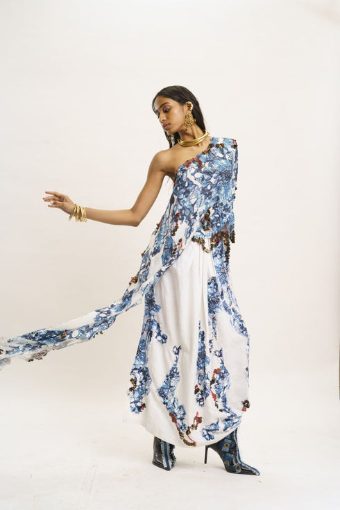 White and blue one shoulder top with lungi skirt