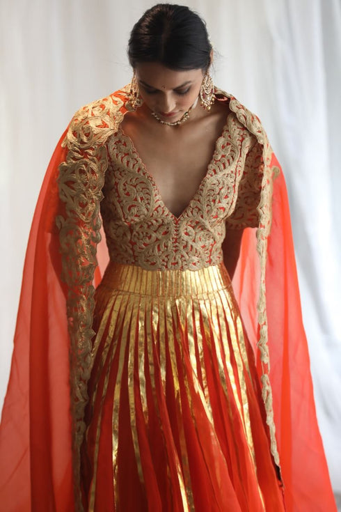 Aikeyah bright orange double layered lehenga set